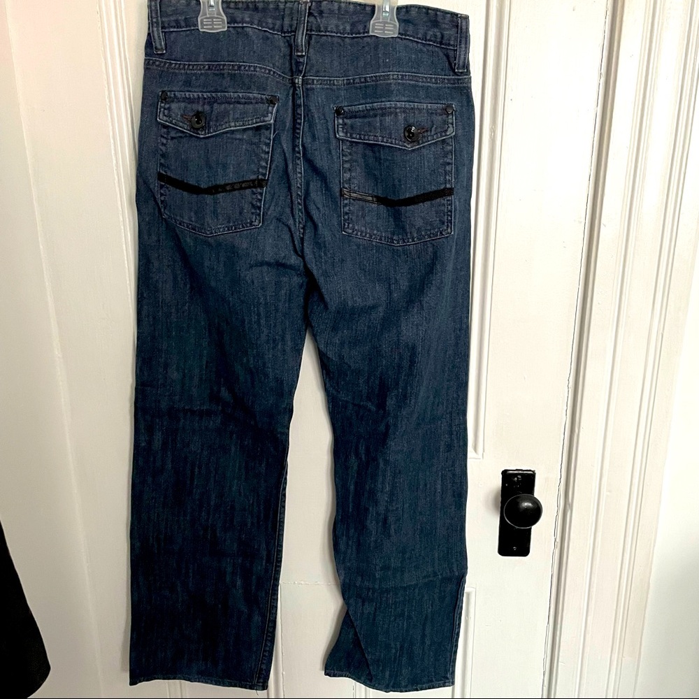 Oakley mens straight leg jeans with cute black detail & buttons  size 34/30